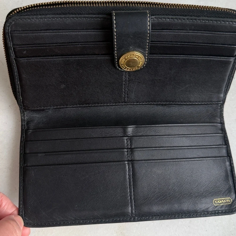 Coach Legacy Signature C jacquard and leather wallet.
